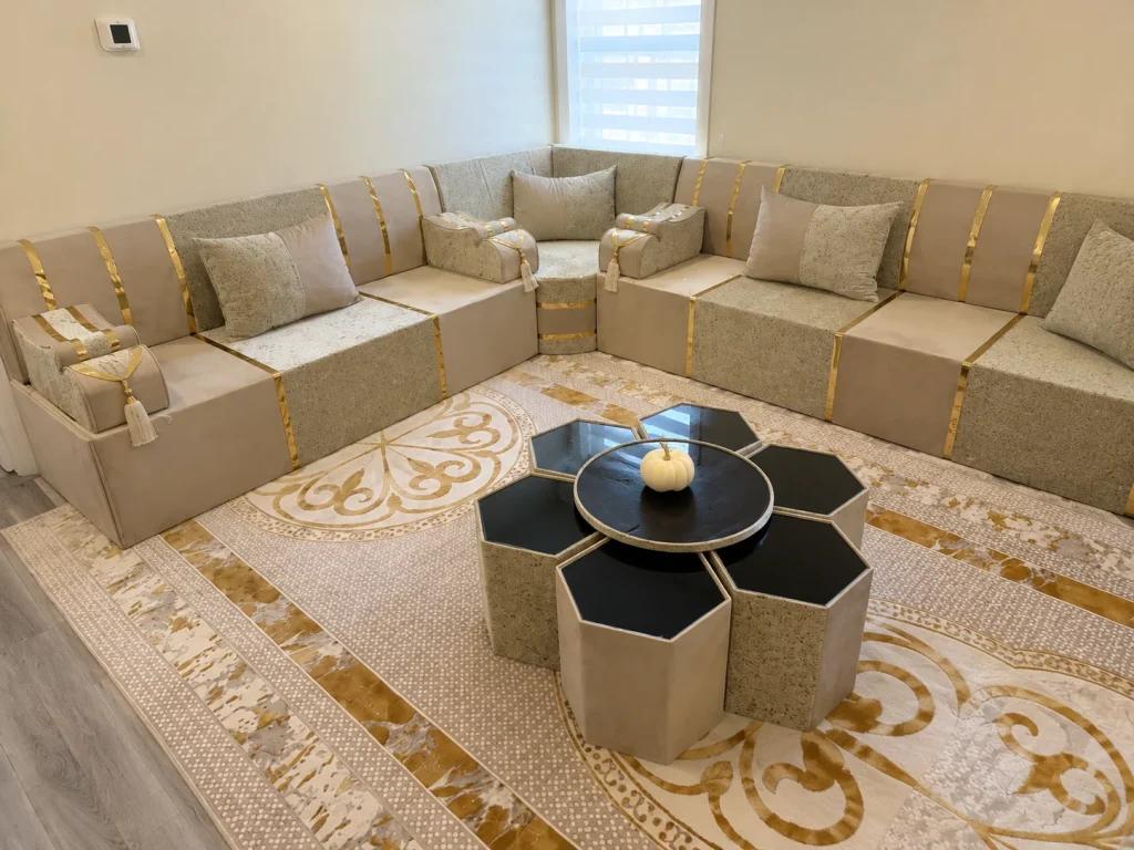 Cream and gold modular hexagonal coffee tables for a custom diwan sofa